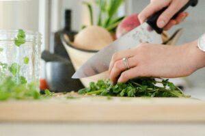 cutting vegetables with a knife