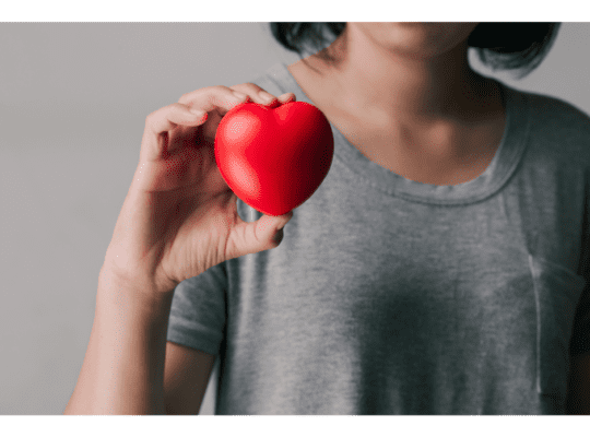 Woman holding Heart